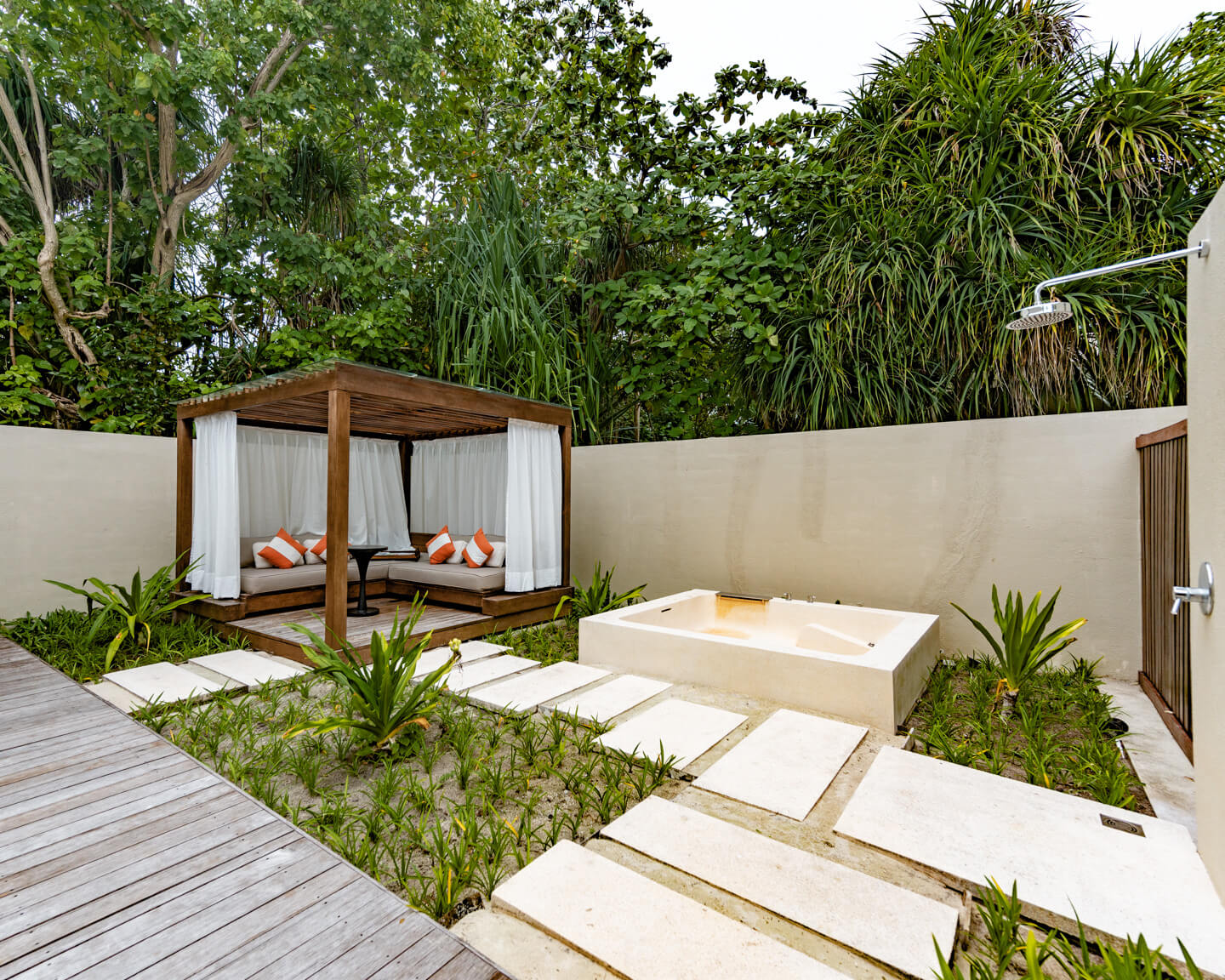 spa area outdoor area with bathtub at the Park Hyatt Maldives Hadahaa