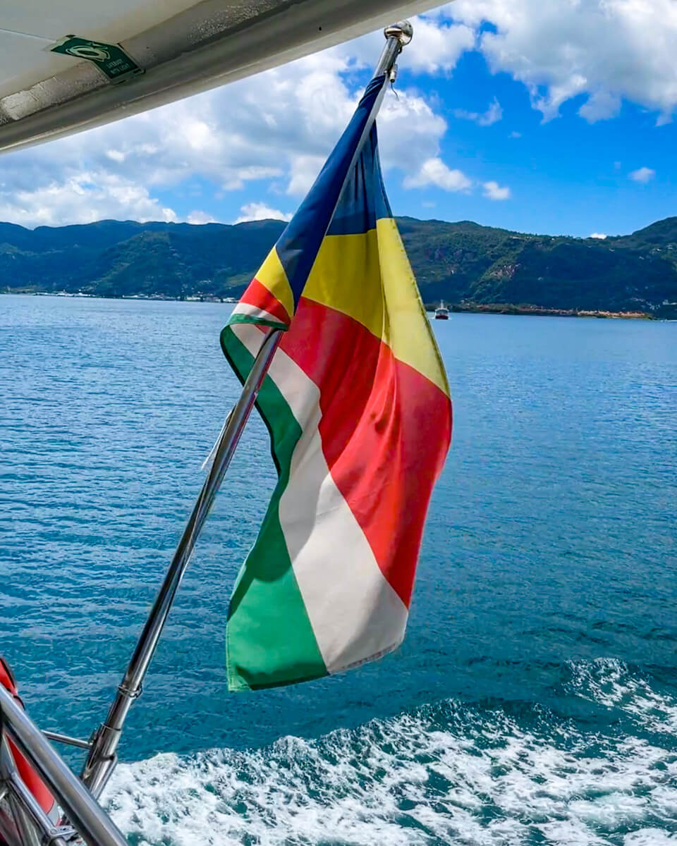 seychelles flag at the ferry, Seychelles Itinerary and travel tips