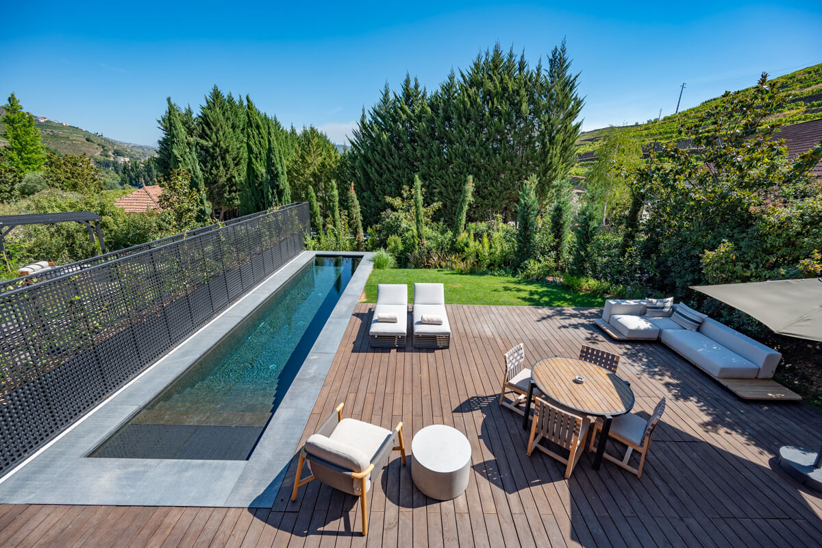 private terrace with pool and lounge area of the pool villa at the six senses Douro valley