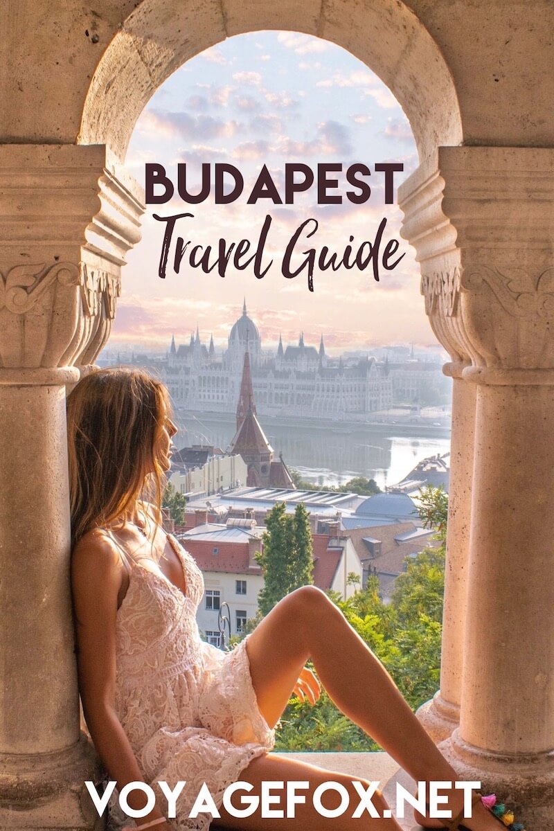 Budapest travel guide cover, sitting at the fisherman's bastion, overlooking the city