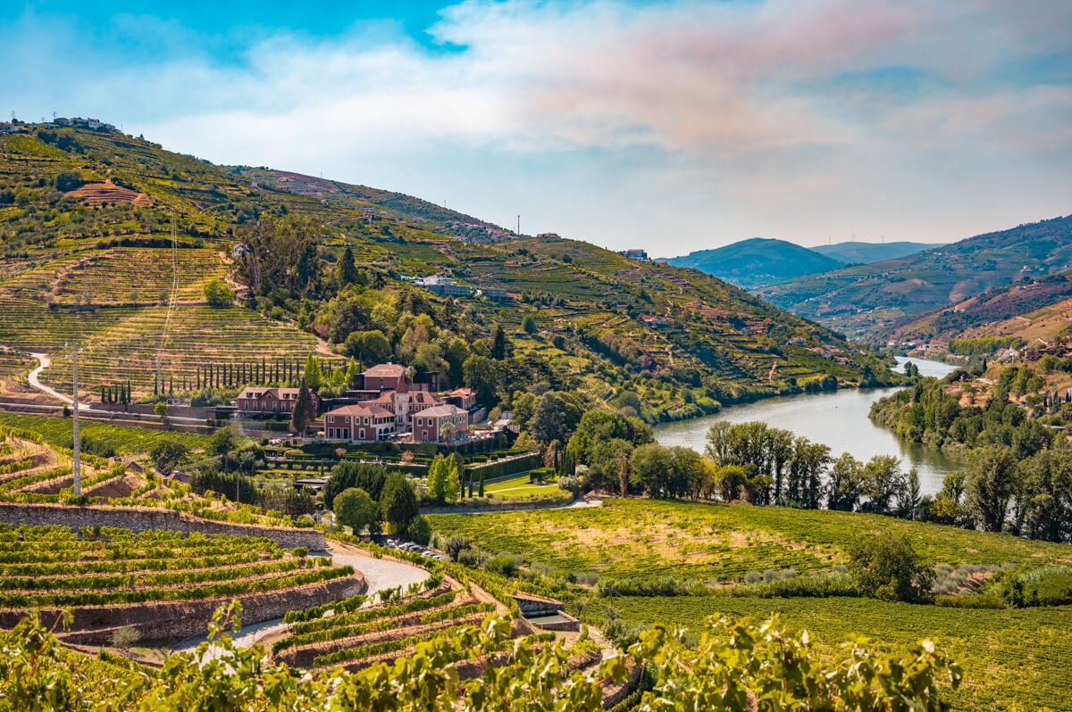 scenic view of the Douro Valley with the river, vineyards and the six senses Douro valley