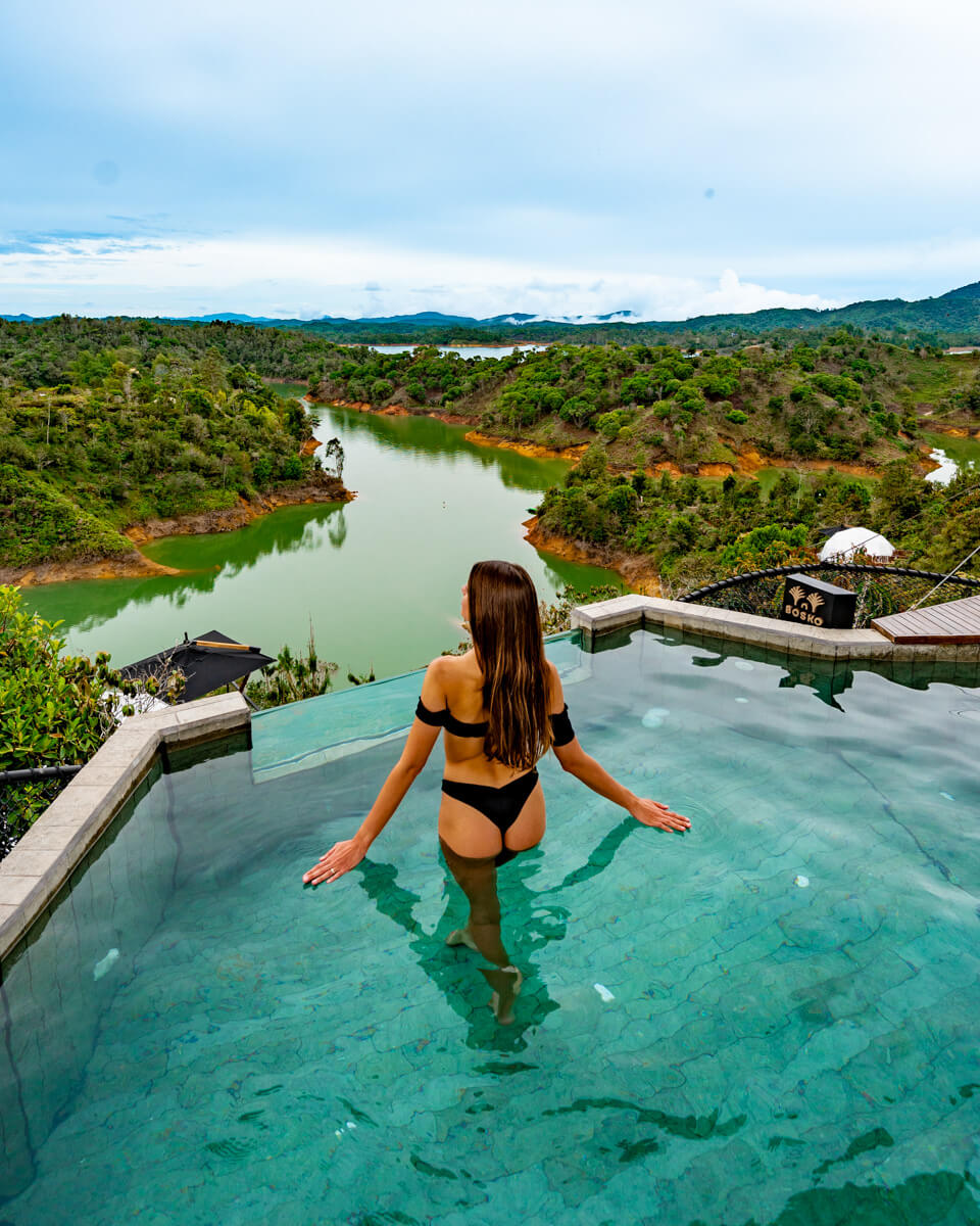 overlooking the Peñol lake in Colombia from an infinity pool