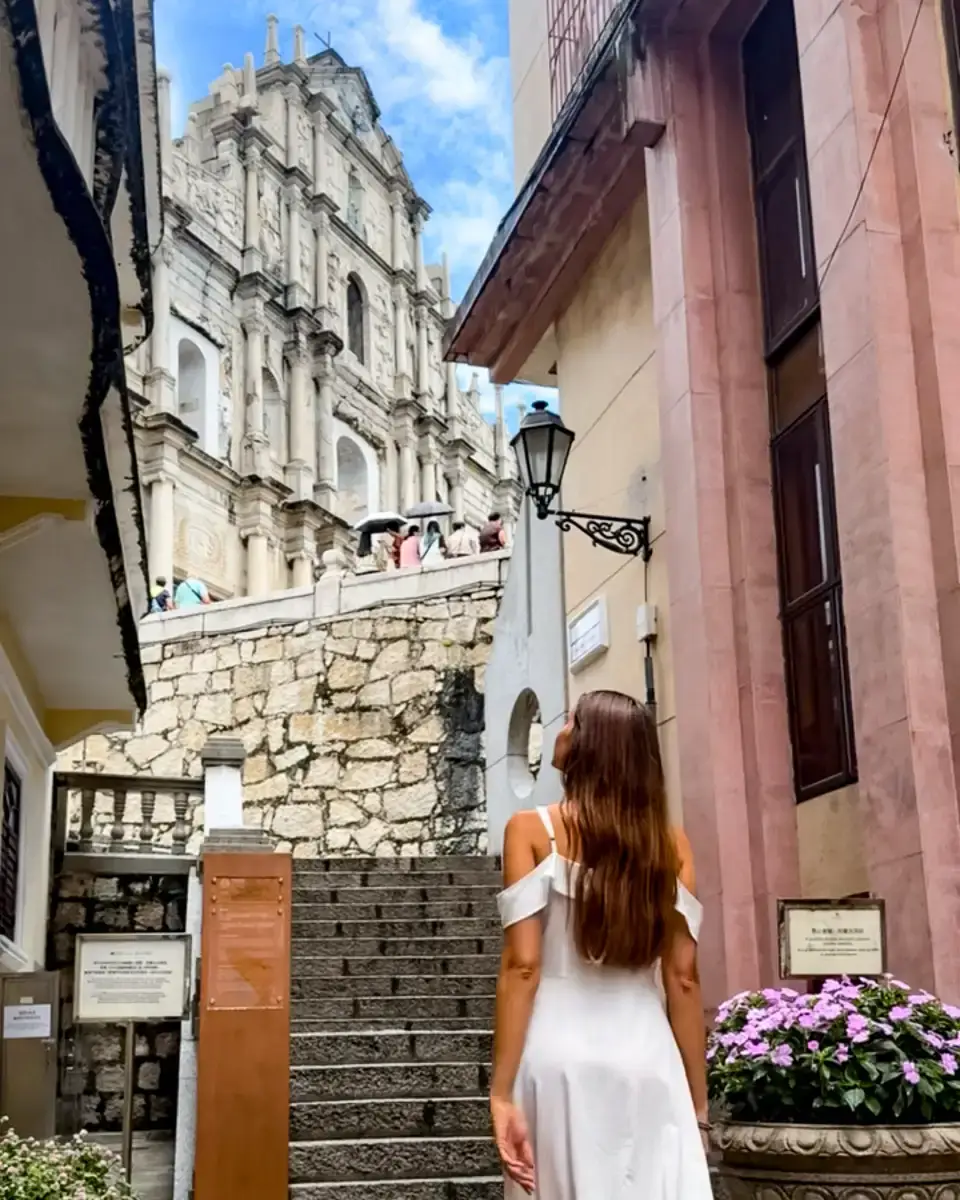 old town Macao, small alley with view of St. Paul's church ruin