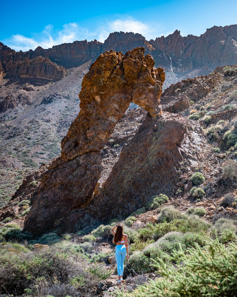 walking in front of the queens shoe rock formation at the Teide National Park in Tenerife