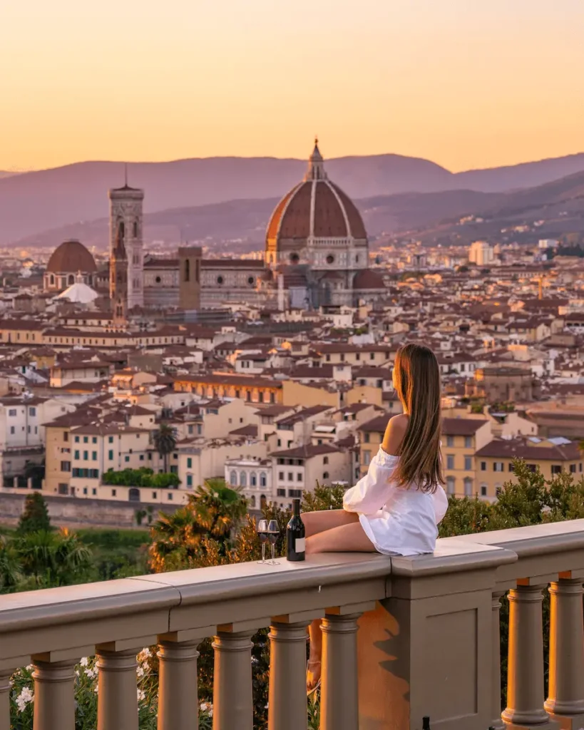 sunset seen from the Piazzale Michelangelo, one of the best things to do in Florence, Italy and a beautiful sight in in the city