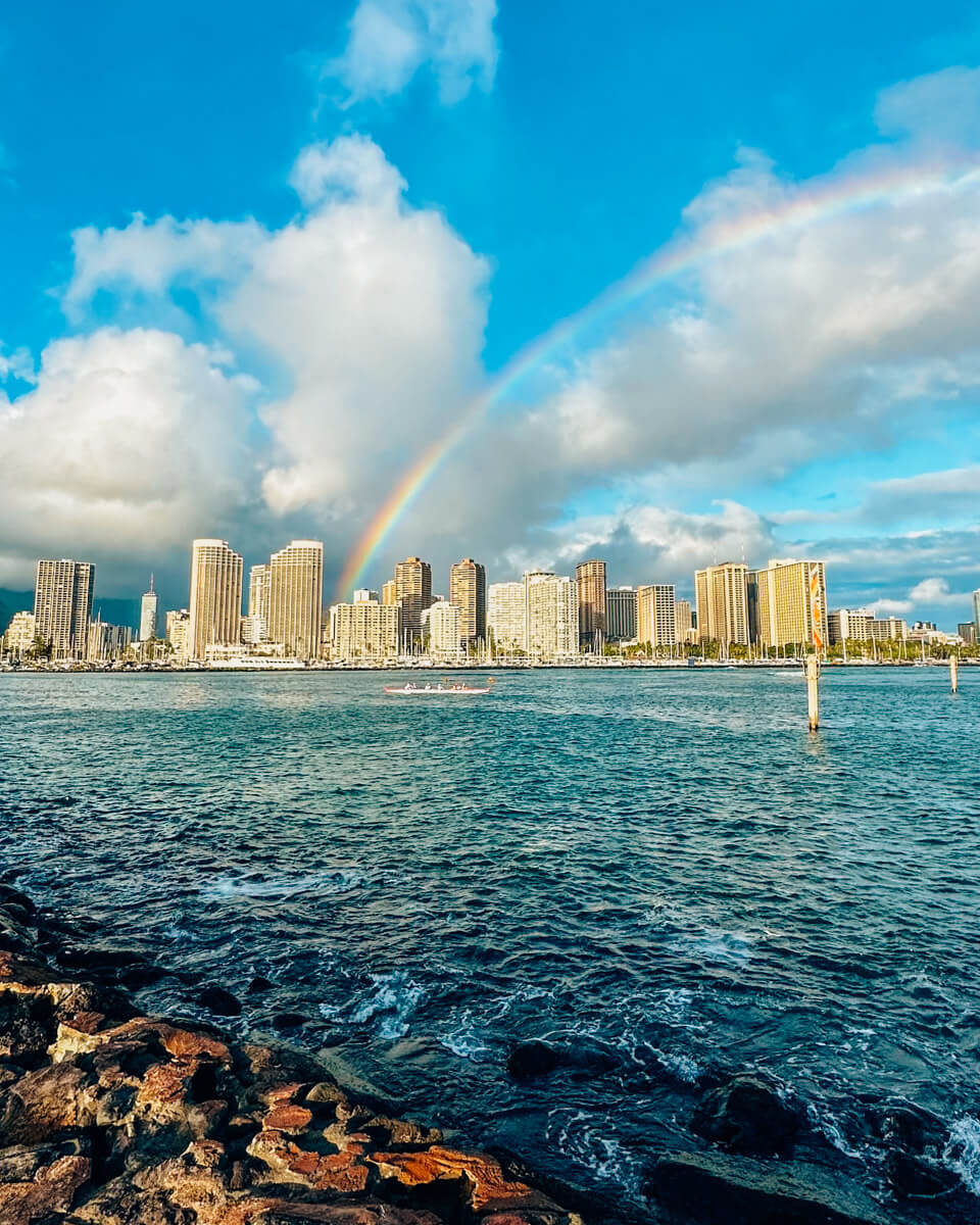 overlooking the Honolulu skyline with a rainbow