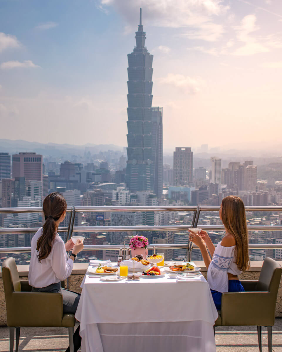 Overlooking the iconic Taipei101 from a breakfast table on top of a rooftop in Taipei, Taiwan