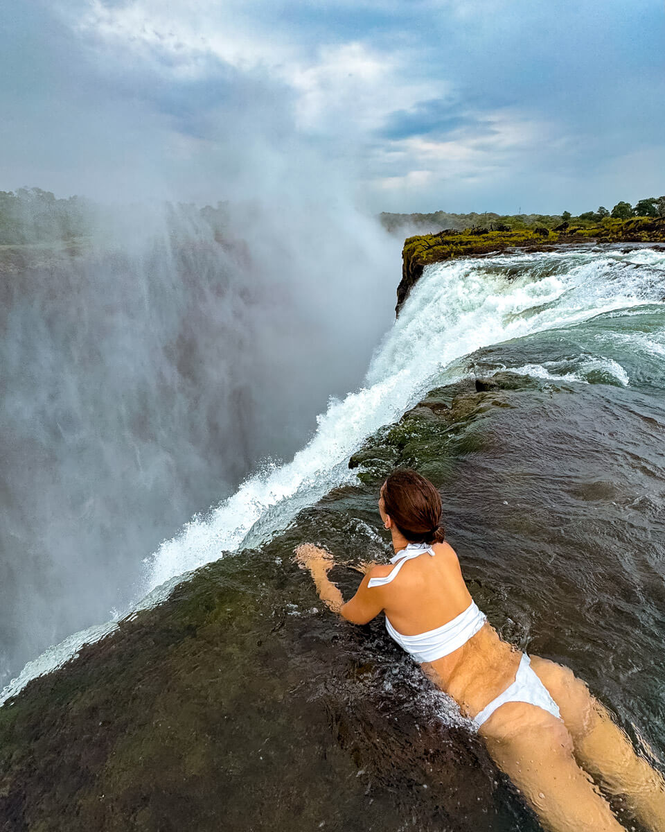 lying at the edge of the Victoria Falls in Zambia at the divild pool