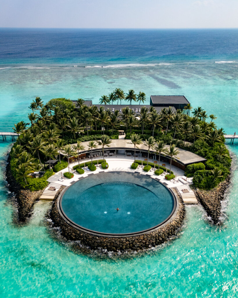 small tropical island in the Maldives with huge circular shaped pool, The Ritz-Carlton Maldives, Fari Islands, Hotel review