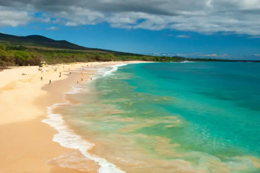 sandy beach with blue water in Maui, Hawaii