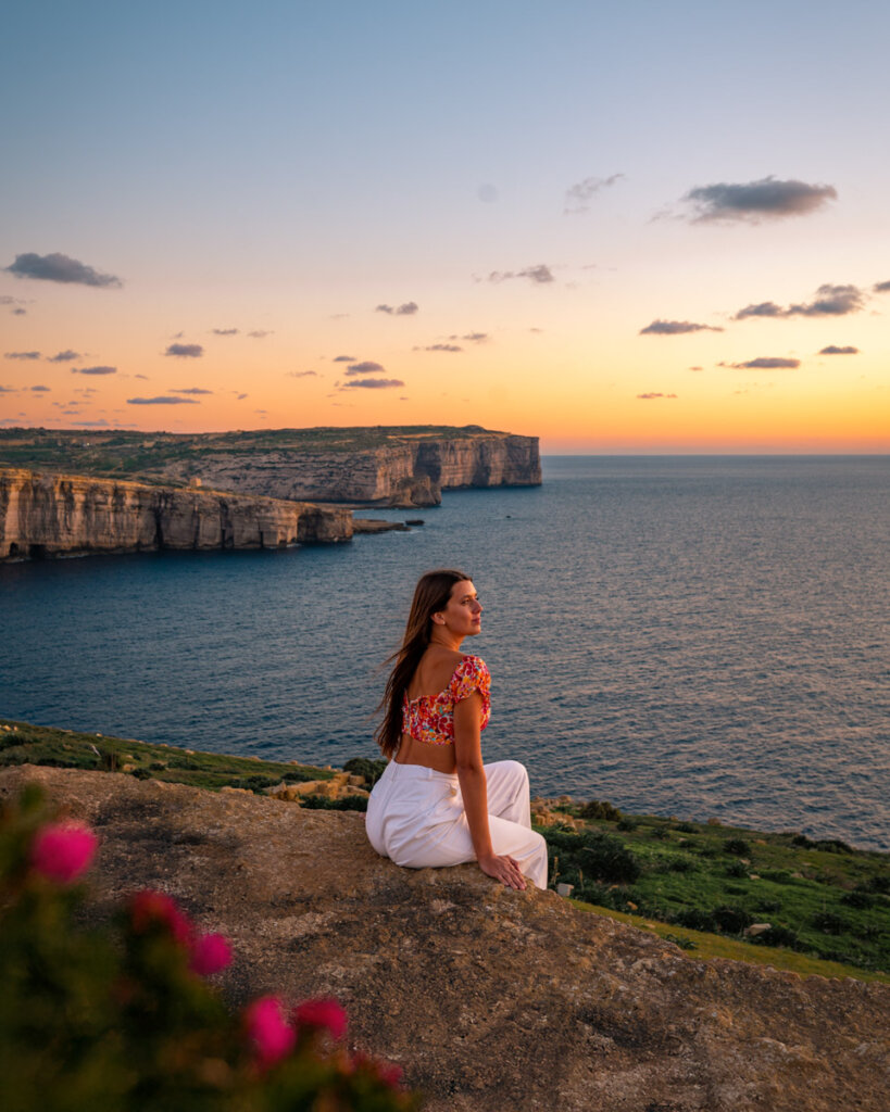 sitting at the coast line of Gozo and enjoying the sunset