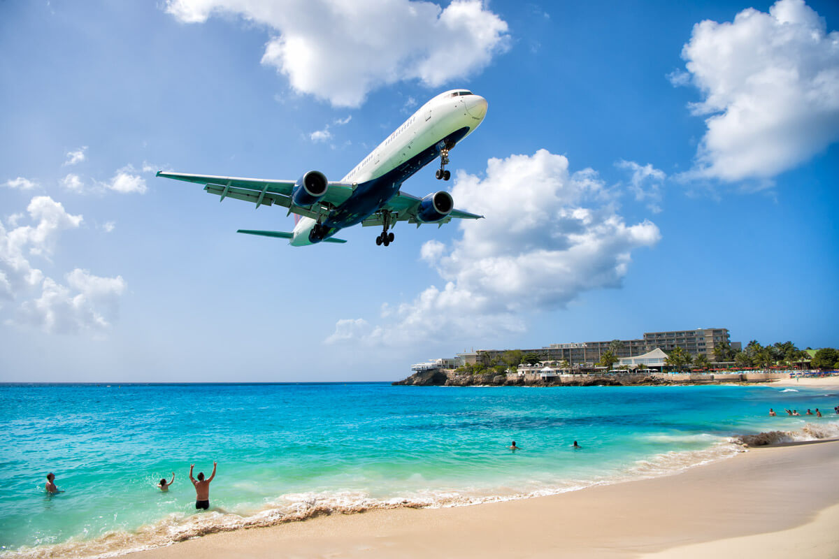 plane landing at Maho Beach in St. Martin in the Caribbean