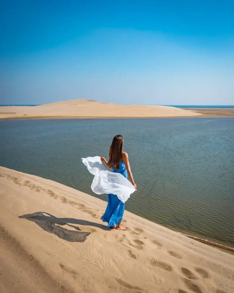 Inland Sea at the desert of Qatar, standing on top of a sand dune overlooking the gulf of qatar