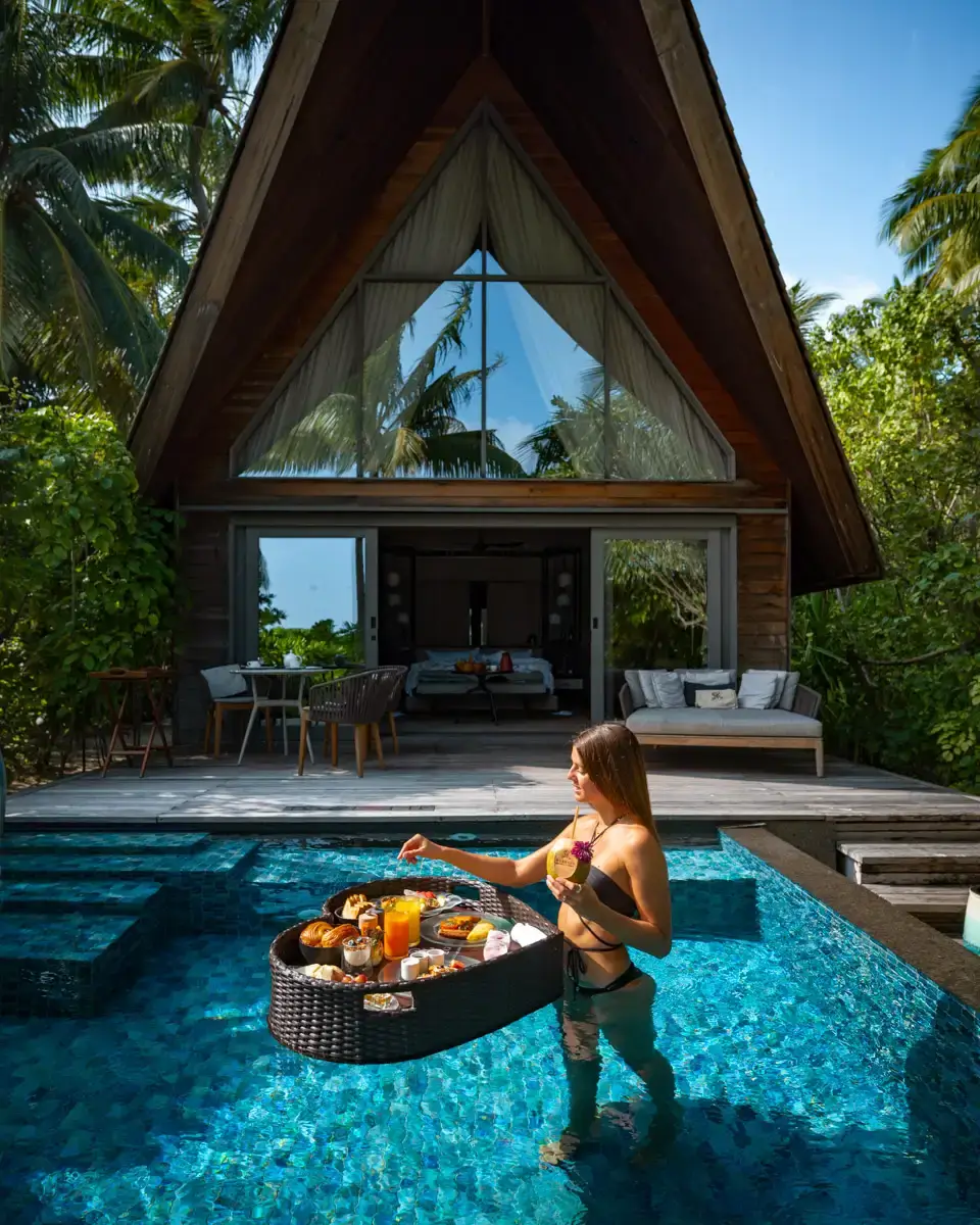 St. Regis Maldives Vommuli Resort, floating breakfast at the pool of a beach villa