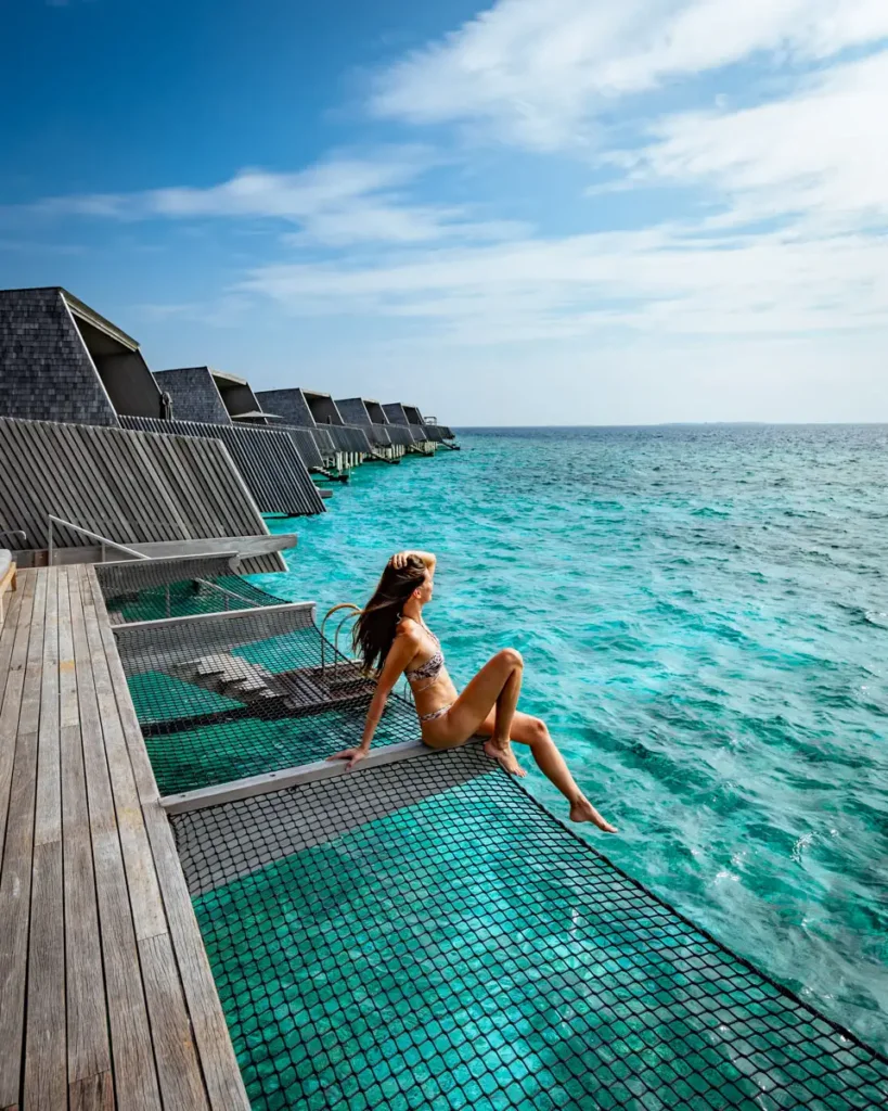 water villa of the St. Regis Maldives Vommuli Resort, with blue water and lagoon