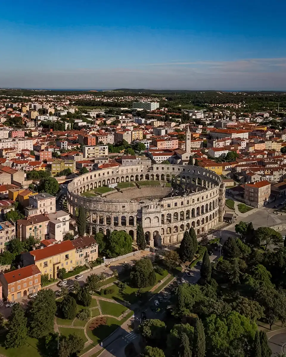 aerial view over the old town and ruin of the pula arena in Croatia