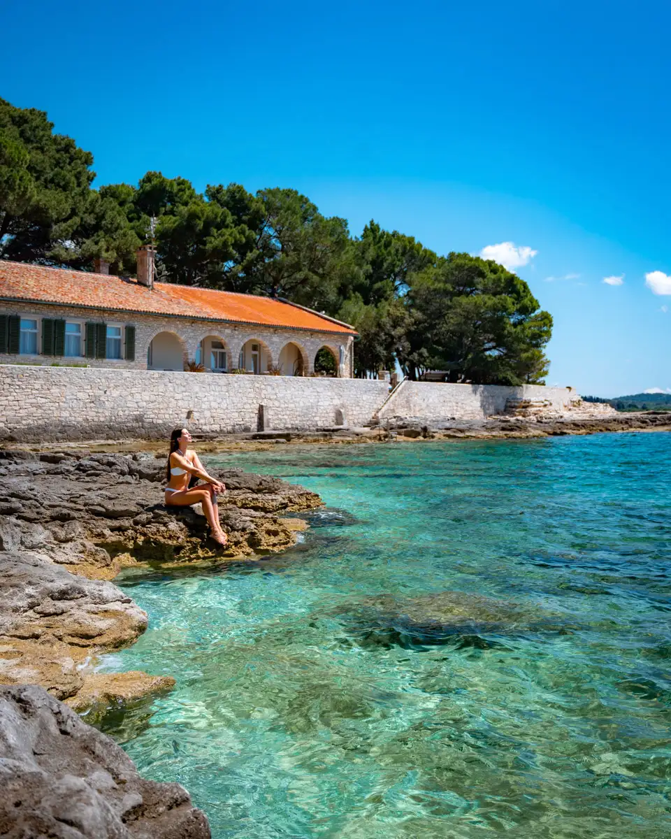 blue water in Brijuni Island in Croatia, the perfect spot to go swimming and to visit in the summertime