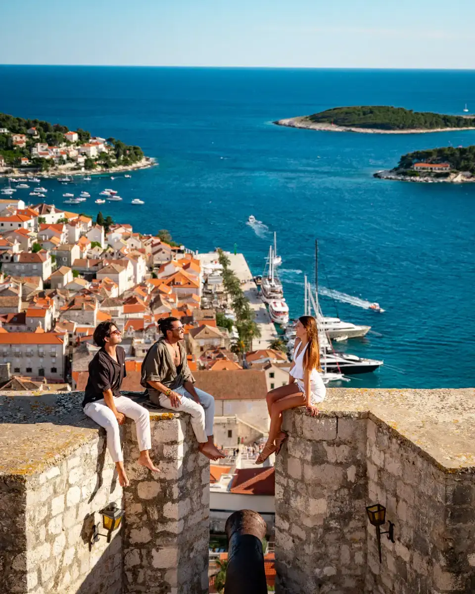 sitting on the ruins of the Spanish Fortress in Hvar, a beautiful island in Croatia