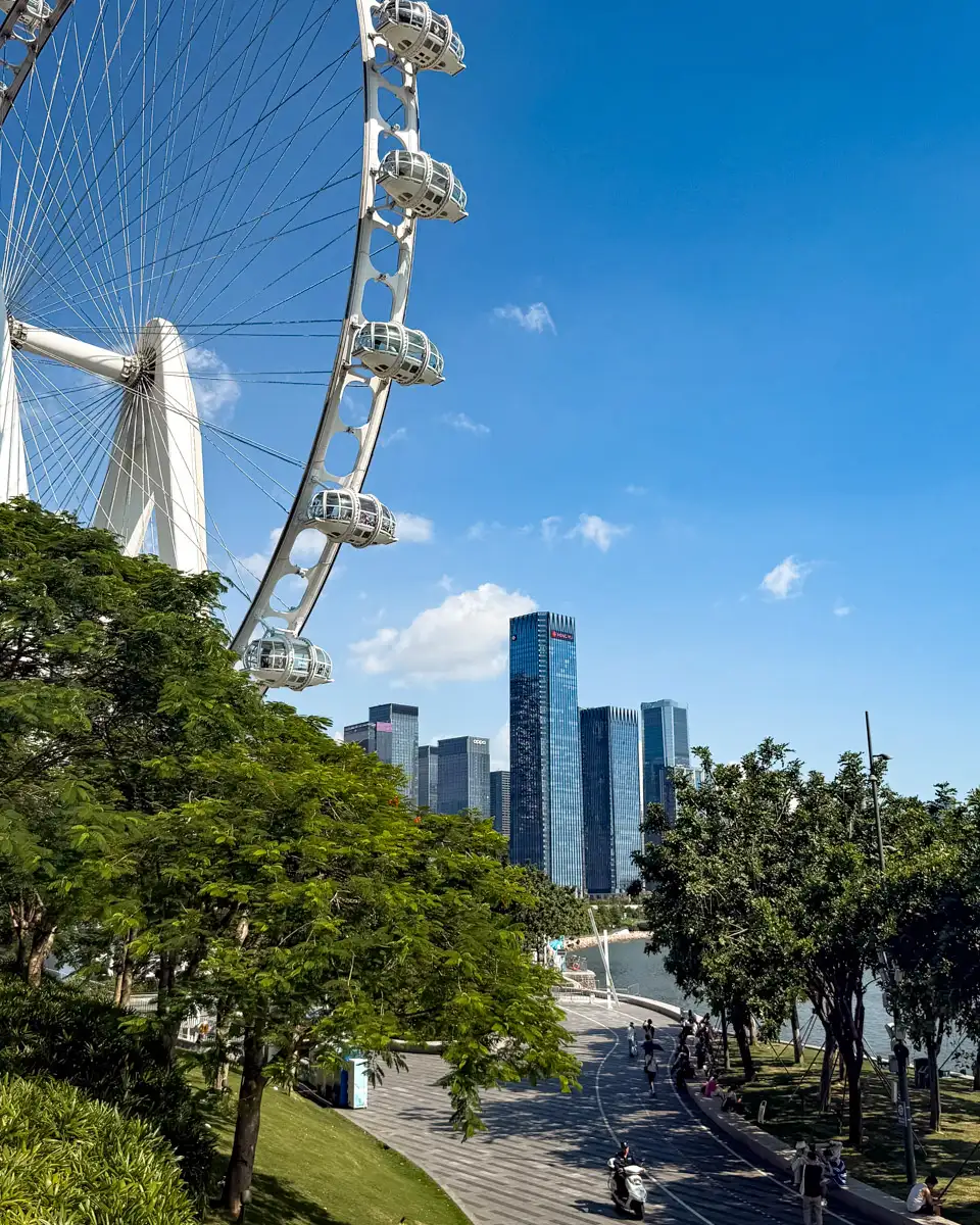 Shenzhen china, harbor walk way with ferris wheel