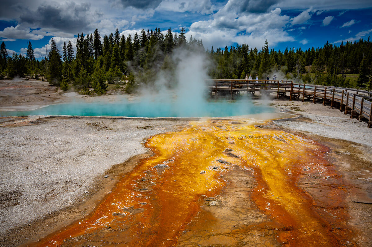 west-thumb-geyser-yellowstone-national-park West thumb geyser, a hot turquoise blue pool in Yellowstone national park, highlight